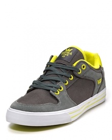 Run, rave, live. The Vaider suede sneaker has bold splashes of neon and a wide, contrast sole.