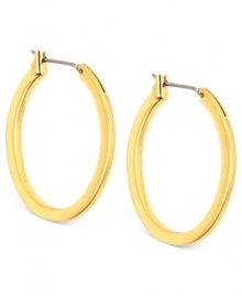 Embrace the oval shape of these hoop earrings from Anne Klein. Crafted from gold-tone mixed metal, the pair puts a stylish twist on a classic silhouette. Approximate diameter: 3/4 inch.