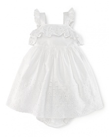 Perfect for special occasions or a little fun in the sun, a charming cotton dress is embellished with dainty ruffles and eyelet embroidery for sweet style.