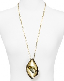 This Alexis Bittar necklace brings sculptural sparkle to your look, accented by a shapely gold plated pendant.