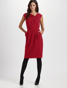 Lightweight wool in a sleek, cap-sleeve style with faux knot detail at the neckline.Asymmetric necklineCap sleevesSlash welt pocketsTwo waist pleatsWaist seamFully linedAbout 24½ from natural waistVirgin woolDry cleanImported of Italian fabricModel shown is 5'9½ (176cm) wearing US size 4.