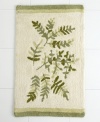 Leafy ferns in forest hues restore the natural order of peace and relaxation in your bath. In cozy 100% cotton, this ivory rug looks and feels fantastic underfoot. With coordinating green trim.