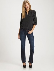 Five-pocket bootcut fit with minimal distressing and a hint of stretch designed just for petite frames. THE FITFitted through hips and thighs Flares slightly from knee to hem Rise, about 8 Inseam, about 32THE DETAILSZip fly Five-pocket style Signature stitching on back pockets Cotton/elastene; machine wash Made in USA Please note: Distressed pattern may vary.