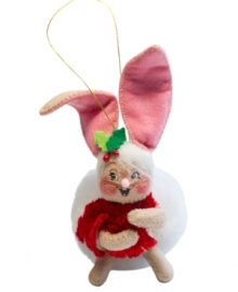 Even animals go wild for Christmas, like this cozy bunny featuring a snowball-sized tail, velvety red sweater and the unmistakable whimsy of Annalee ornaments.