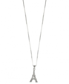 Parisian flair, by Anne Klein. This sweet pendant necklace from Anne Klein flaunts international appeal with an Eiffel Tower charm embellished with pave accents. Crafted in silver tone mixed metal. Approximate length: 16 inches + 2-inch extender. Approximate drop: 3/4 inch.