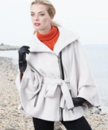 Calvin Klein gives a refined, minimalist look to outerwear with this chic cape. The faux-leather trim adds appealing edge.