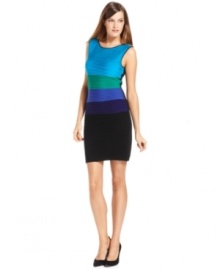 Calvin Klein makes a colorblocked dress even more eye-catching with a fully pleated look that highlights the hues even more.