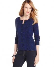 A chic animal print awakens this basic cardigan from Top Knits! Pair it with skinny jeans for an on-trend look.