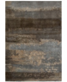 Richly textured, Calvin Klein's collection of luster-washed rugs bring an element of earthy, modern luxury to your home. The slate rug is handcrafted of plush wool in silvery pewter tones and finished with a special wash to produce an elegant patina.