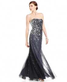 Adrianna Papell's latest gown is red-carpet worthy: Sparkling clustered sequins through the bodice and hips  gradually become a lighter sprinkling toward the hem for a truly stunning effect.