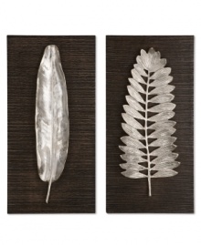 Standout wall art. Two polished aluminum leaves spring from ebony-stained panels, adding brilliant dimension and natural allure beside a table or above the bed.