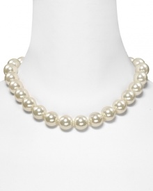 A bold horseshoe clasp detail lends contemporary style to this glass pearl necklace from Lauren By Ralph Lauren.