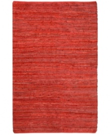 Olé! Spice up your decor with the gorgeously festive style of the Matador rug from St. Croix. Durable leather strips in vibrant pomegranate hues are meticulously hand woven with fine cotton strands, resulting in a beautiful, rustic texture and natural braided pattern that accents even the most eclectic decor.