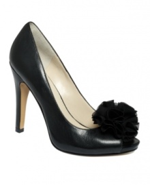 Fanciful fashion. Nine West feminizes the classic office shoe by adding a lovely flower to the Excavate peep-toe pumps.