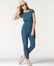 An on-trend casual look, this printed Bar III jumpsuit features a buttoned envelope-style back for an unexpected element!