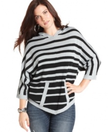 Top off your fave jeans with Belle Du Jour's plus size poncho sweater, showcasing on-trend stripes!