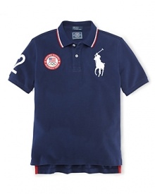 A preppy short-sleeved polo shirt in breathable cotton mesh is accented with London embroidery and a US Olympic Team embroidered emblem, celebrating Team USA's participation in the 2012 Olympics.