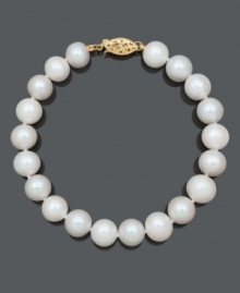 A timeless piece that makes the perfect gift. Bracelet features a simple strand of cultured freshwater pearls (9-10 mm) with a 14k gold clasp. Approximate length: 8 inches.