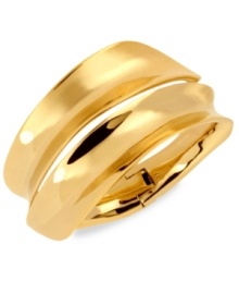 Shaping up to be something special, this hinged bangle from Robert Lee Morris is crafted from gold-tone mixed metal and goes beyond the perfect circle with a concave design. Approximate diameter: 2-1/4 inches.