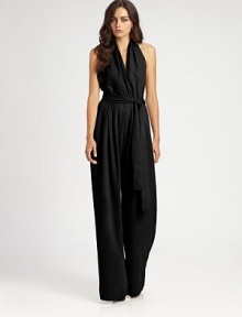 Gorgeous matte tencel cut in a sophisticated halter jumpsuit finished with soft pleating and a waist-nipping belt.Halter necklineCrossover bodiceSelf beltOpen backCenter back zipperBack welt pocketsAbout 65 from shoulder to hemTencelDry cleanImportedModel shown is 5'9 (175cm) wearing US size 4.