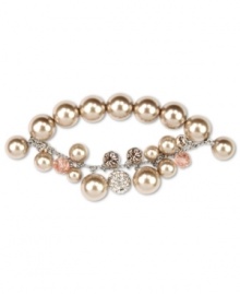 Make them blush. This half-stretch bracelet from Givenchy breathes sophistication with blush-colored glass pearls, silk glass stones and beaded accents. Crafted in imitation rhodium mixed metal. Approximate diameter: 2-1/8 inches.