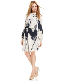 Vince Camuto outfits this dress with a decadent print that can easily swing between your day and night functions.