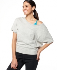 Get a dance-inspired look with this Ideology top, featuring chic dolman sleeves and a boat neckline. It's a great layering piece for the gym and beyond!