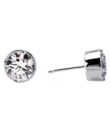 Every girl's sparkling go-to. CRISLU's must-have stud earrings feature round-cut bezel-set cubic zirconias (4 ct. t.w.) set in platinum over sterling silver. Approximate diameter: 9 mm.