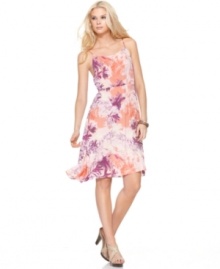 A tropical floral print gets a little abstract and rendered in a modern color palette in this Calvin Klein Jeans dress.