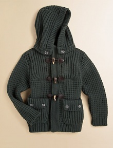 A rustic hip-length layer in a chunky waffle knit with a versatile detachable hood and preppy toggle details.Detachable button hoodRibbed stand collarLong sleeves with ribbed cuffsElbow patch detailFront toggle closureFront patch button pocketsRibbed hem80% wool/20% nylonHand washMade in Italy