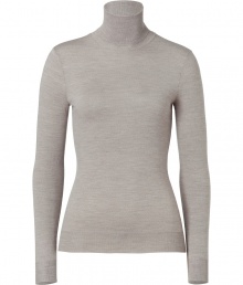 Luxe basics anchor any modern wardrobe, and Ralph Laurens pale brown merino wool pullover proves an elegant indispensable - Fitted, feminine cut tapers through waist - Long sleeves and turtleneck collar - Finely ribbed trim at cuffs and hem - Versatile and polished, seamlessly goes from work to weekend - Pair with everything from pencil skirts and suit trousers to skinny denim and leather pants