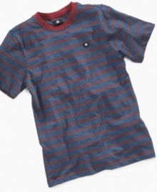 Fresh allover stripes on this tee from DC Shoes will make him want to run out and skate.