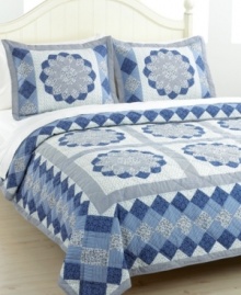 Blue blossoms in an array of fabrics create a mosaic of pure tranquility. The Blue Dahlia quilt set is hand-pieced for a traditional look and feel that makes a wonderful update for master and guest bedrooms alike.