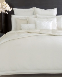 Crafted of luxe 400-thread count cotton sateen, these White Gold pillowcases from Donna Karan features chic pleating along the hem for a polished look.