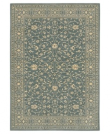 Cool and cordial, this sweet Karastan area rug welcomes you to the most comfortable spot in your home. A lane-blue ground is trimmed with soft beige patterns in a pleasing design inspired by antique English manor house rugs. Wool construction with cotton foundation for added strength and softness.