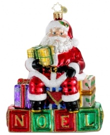 The cool kid on the block, Santa Claus gets the party started every Christmas with a message of noel. With the exquisite Polonaise glass and festive glitter of Christopher Radko ornaments.