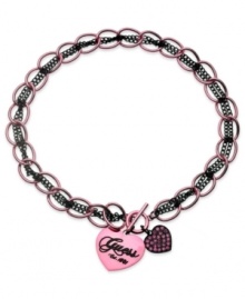 Style worth adoring, by GUESS. The lovely combination of jet black and rosy pink creates a pretty necklace silhouette. With a toggle closure and double heart pendants embellished with epoxy and glass accents. Crafted in sprayed jet tone and rose tone mixed metal. Approximate length: 16 inches + 2-inch extender. Approximate drop: 1 inch.