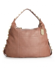 In the softest leather, this slouchy handbag by Vince Camuto has a clean façade, accented with faceted studs along the sides and handles for the perfect measure of metallic detailing.