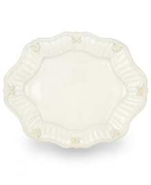 Serve every main course with exquisite taste. Featuring a raised pattern of cascading vines, elegant fluting and a gently scalloped rim, this large oval platter brings distinctly vintage style to the table. Coordinates with Butler's Pantry dinnerware and dishes collection. Qualifies for Rebate