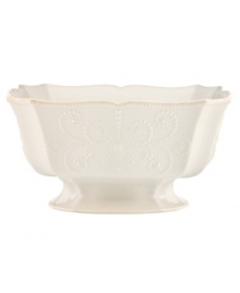 With fanciful beading and a feminine shape, this centerpiece bowl from the Lenox French Perle dinnerware collection has an irresistibly old-fashioned sensibility. Hard-wearing stoneware is dishwasher safe and, in a soft white hue with antiqued trim, a graceful addition to every meal. Qualifies for Rebate