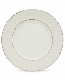 Pure opulence. Posh opalescence. This classically designed line of dinner plates from Lenox's dinnerware and dishes collection are accented by a platinum rim and a delicate flourish of vine-like, white-on-white imprints with raised, iridescent enamel dots. Great gift for housewarming, wedding or yourself. Dinner plate shown center. Qualifies for Rebate