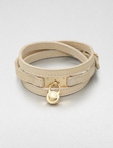 This effortless style features a chic logo accented padlock charm on a supple wrapped leather strip. LeatherGoldtone brassLength, about 25Buckle closureImported 