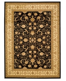 Dazzling mystery. Capturing the intricacies of ancient Persian designs, the Lyndhurst area rug presents an updated version in gorgeous ivory over a black ground. Made with durable polypropylene in a soft, low pile for the modern home.