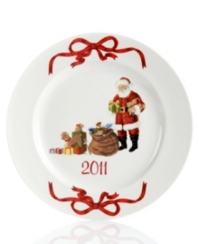 Martha Stewart Collection makes the table merrier with this porcelain Santa plate. A beautiful collectible that's also made for the rigors of holiday dining, it features a classic Christmas scene and graceful red bows to complement your holiday dinnerware and dishes. (Clearance)