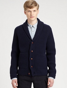 Undeniable style and comfort defines this classic cardigan sweater, impeccably knitted from fine lambswool with large patch pockets at the waist for added warmth.Button-frontShawl collarWaist patch pocketsRibbed knit cuffs and hemLambswoolDry cleanImported