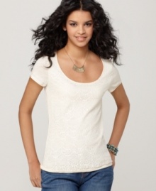 Lucky Brand Jeans revamps the classic tee with a feminine scoop neckline and lace at the front. Pair it with rugged jeans for a high contrast look!