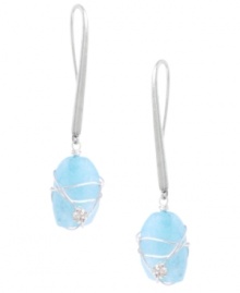 It's a wrap! Wrapped jewelry styles are the latest craze and Kenneth Cole New York's stunning design is no exception. Earrings feature a semi-precious blue quartz stone, sparkling crystal accents, and a silver tone mixed metal setting. Approximate drop: 2-1/4 inches.