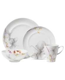 A natural at modern tables, the Aliza Gris place setting from Mikasa creates a serene landscape for casual dining. White porcelain with watercolor florals is sleek and elegant in form, but offers everyday durability.