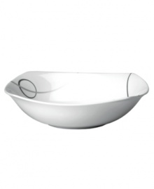 With a free-flowing circle design in shades of gray from Mikasa dinnerware, dishes like this softly squared vegetable bowl add fun, contemporary appeal to any table. In ultra-durable porcelain.