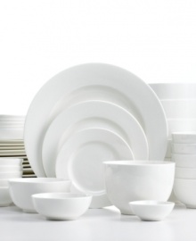 A blank canvas for your finest food creations, this white dinnerware set from Gibson offers timeless service for six. In dishwasher- and microwave-safe porcelain so you can relax and enjoy everyday meals or entertain guests with ease.